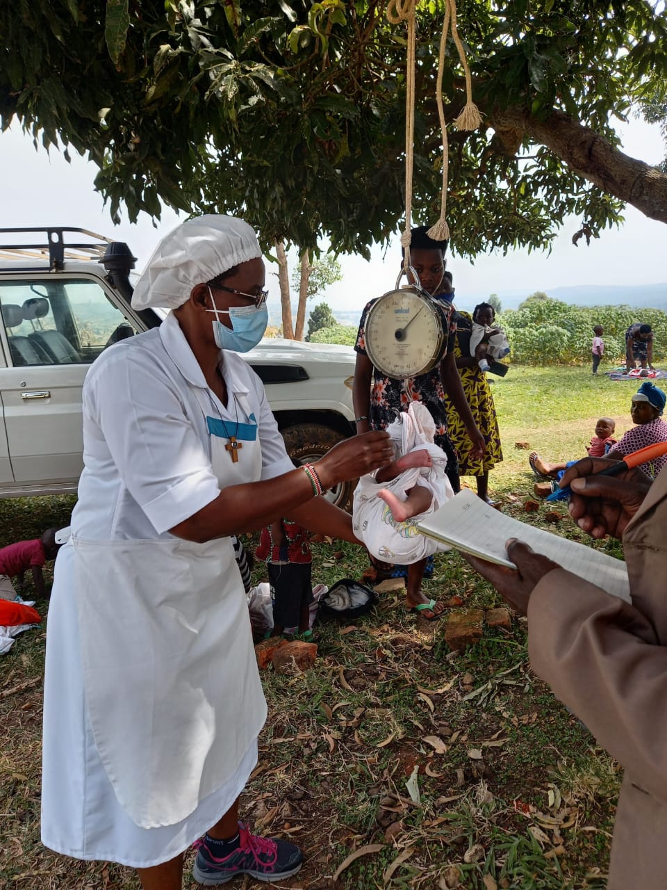 Sister Jacinta tree planting at their facility's formation house